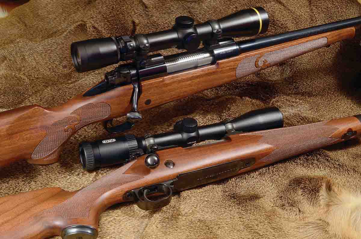 The Winchester Model 70 Featherweight (top) combines classic lines with the Featherweight’s old stylistic touches, and the result is a very elegant mountain rifle. The scope is a Leupold VX-III 2.5-8x 36mm. The Winchester Model 70 Super Grade (bottom) has classic lines in a deluxe edition and is scoped with a Meopta Meopro 3-9x 40mm.